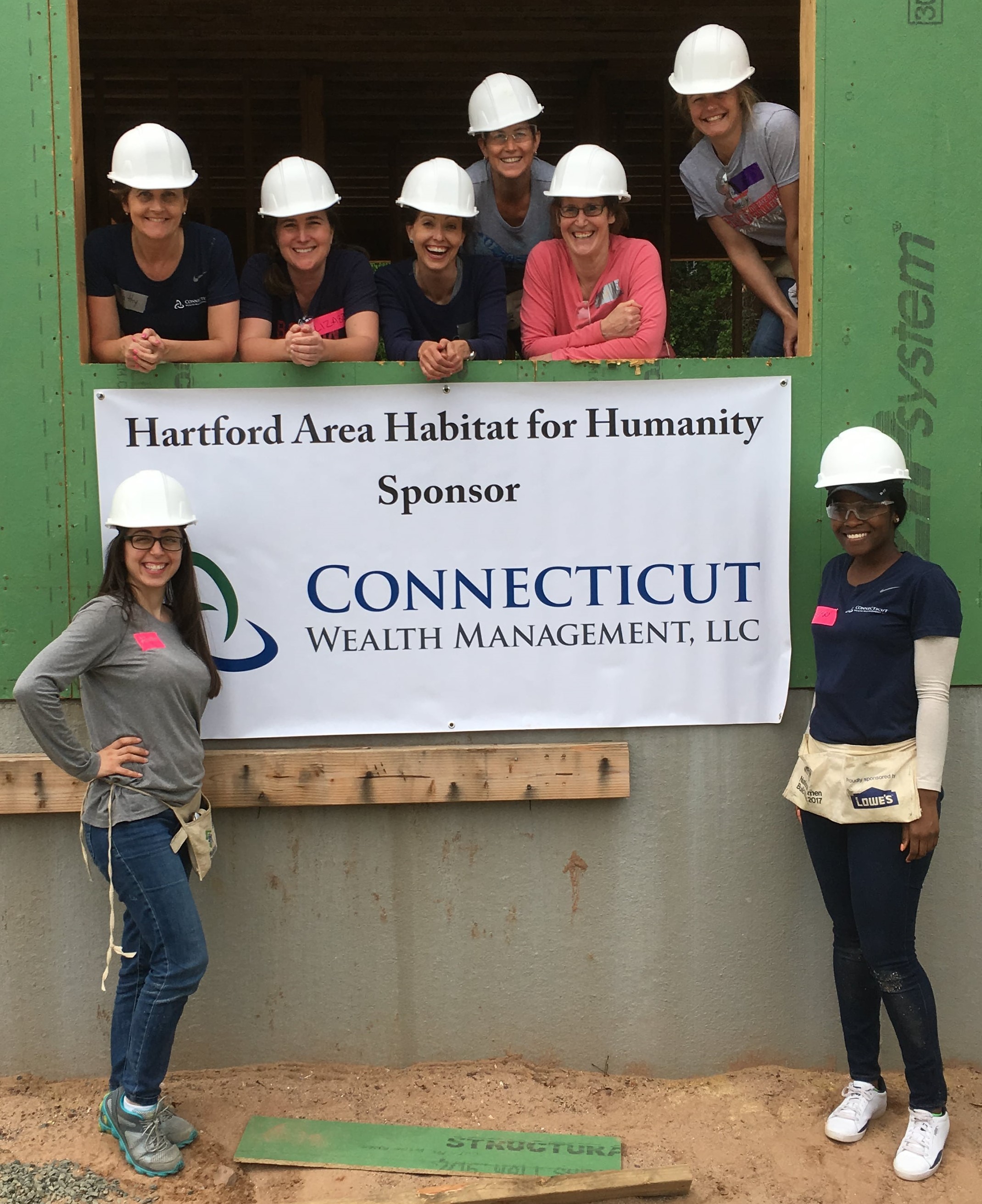 The women of Connecticut Wealth Management pose for a shot at the 2017 Habitat for Humanity build.